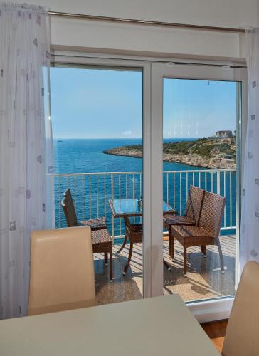 Duplex Three-Bedroom Apartment with Balcony and Sea View