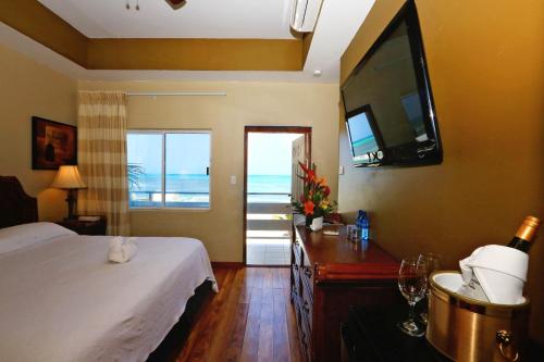 Hotel Royal Blue & Golf Cart Rental in Sanpedro