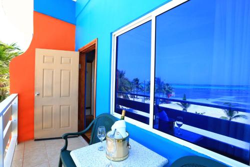 Hotel Royal Blue & Golf Cart Rental in Sanpedro