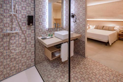 Hotel Alhambra Set in a prime location of Costa Brava y Maresme, Hotel Alhambra puts everything the city has to offer just outside your doorstep. Offering a variety of facilities and services, the property provides 