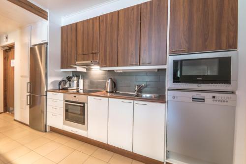 кухня, Villa Ylläs 301 (Villa Yllas 301) in Іллас'ярві