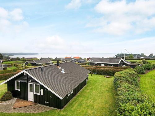. Three-Bedroom Holiday home in Rønde 1