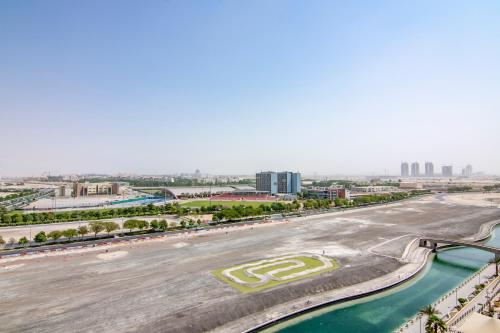 One Bedroom Apartment in Venetian Tower Dubai Sports City by Deluxe Holiday Homes - image 3
