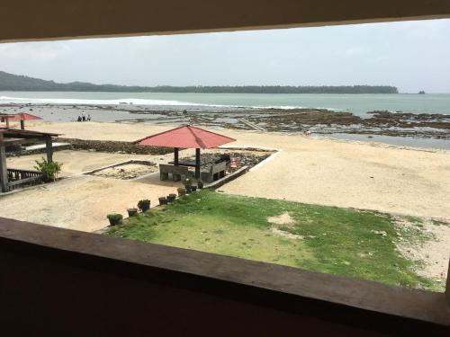 Balcony/terrace, Nias Kristov Surf Camp in Botohilitano