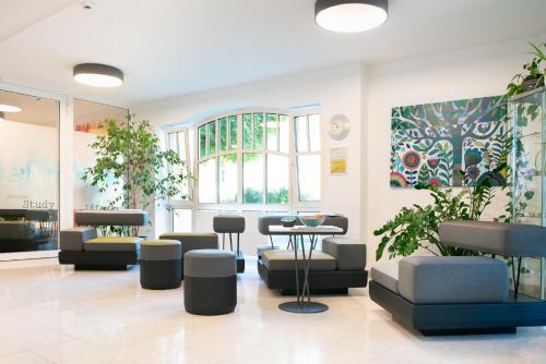 Vestíbulo, myNext - Riverside Hotel Salzburg in Salzsburgo