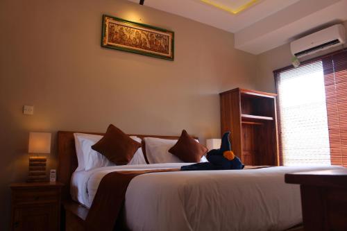 Jangkrik Homestay Jangkrik Homestay is conveniently located in the popular Ubud area. The hotel has everything you need for a comfortable stay. Service-minded staff will welcome and guide you at the Jangkrik Homestay. 