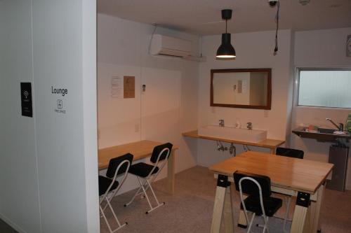 Ruang bersama/area TV, Guesthouse Banvina in Kagoshima