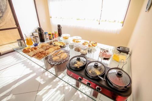 Food and beverages, Suites Natalia Enseada in Balneario Cidade Atlantica