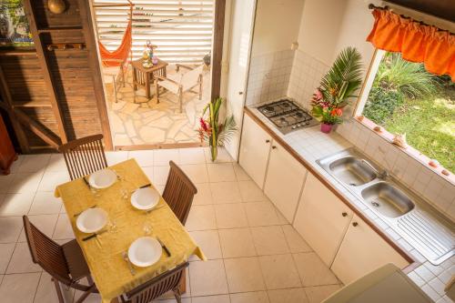 Kitchen, Les jardins de Pointe Noire in Pointe-Noire