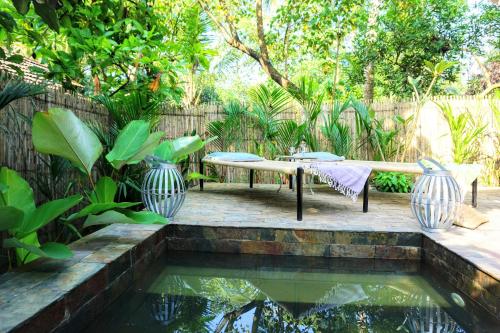 Uitzicht, Sunsets and Palm Trees in Kuttanad Taluk