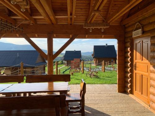 Domki Zagroda Domek z bala z basenem & sauna & balia z hydromasażem