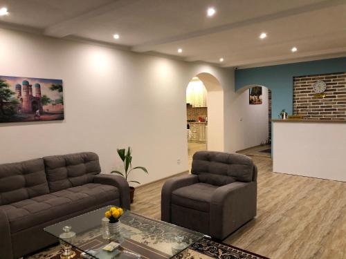 Shared lounge/TV area, Koonjak in Bukhara