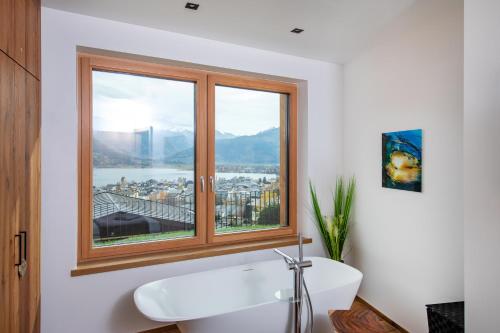  Apartments Adlerhorst Top 1 Zell am See with private sauna and Zell am See Kaprun summercard in summer in Zell am See