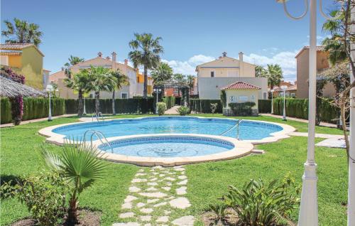 Nice home in Oliva w/ WiFi, Outdoor swimming pool and 2 Bedrooms gîte à louer Club de Golf Oliva Nova
