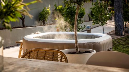 Boutique Villa Moraira, private luxe villa with views all at one level 1000m2, heated pool & jacuzzi WIFI close to center Moraira