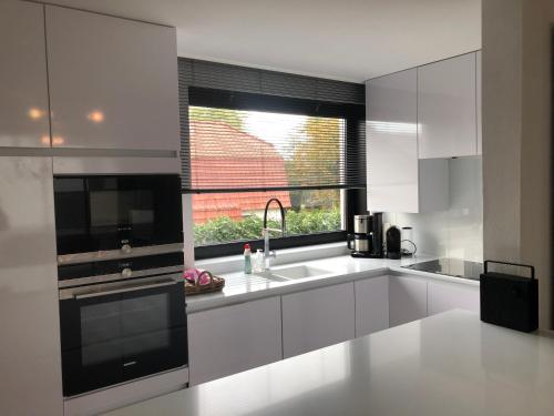 Villa Georges met tuin en sauna in Koksijde