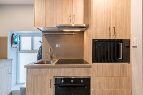 Konyha, Ensuite King Single Room - AC - Next to Central - Closely Located to Almost Sydney Must Seen Spots in Központ