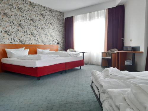 2 twin beds, 1 sofa bed