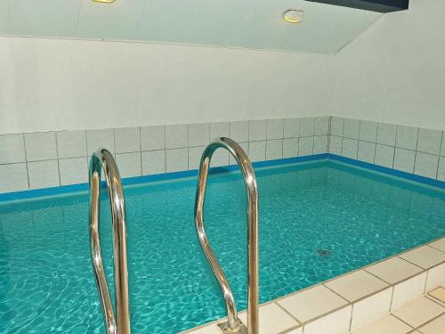 Four-Bedroom Holiday home in Henne 10