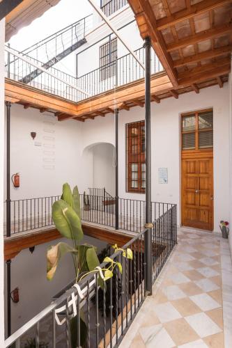 Abades Giralda Suite - Tap to explore photos