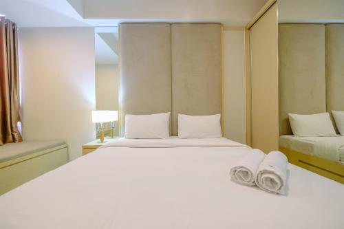 Studio Apartment room in Exclusive Studio at The Oasis Cikarang Apartment By Travelio