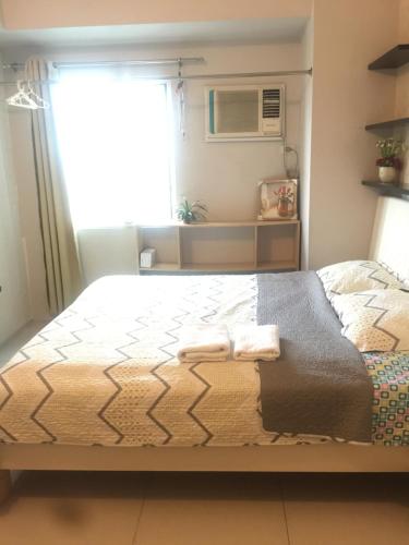 grass residence nearby SM North with fully furniture and wifi