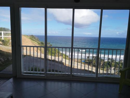 balkong/terrass, STUDIO Le Phare, terrasse, très belle vue océan, très calme, plages à proximité, aucun vis-à-vis (Joli studio climatise avec grande terrasse, tres belle vue ocean, tres calme, plages a proximite, au) in Terre-de-Haut