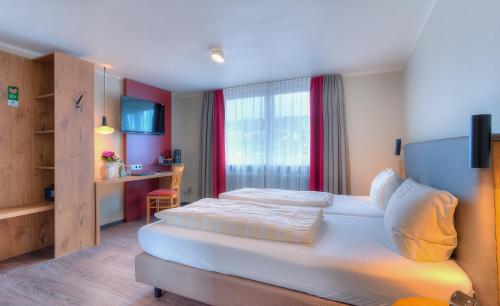 Best Western Hotel Brunnenhof Hotel Brunnenhof is perfectly located for both business and leisure guests in Weibersbrunn. Offering a variety of facilities and services, the hotel provides all you need for a good nights sleep. Fac