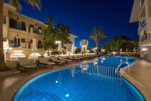 Swimming pool, Kalyves Beach Hotel in Armeni