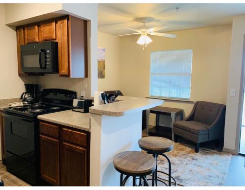 Konyha, Eagle's Den Suites Andrews a Travelodge by Wyndham in Andrews (TX)