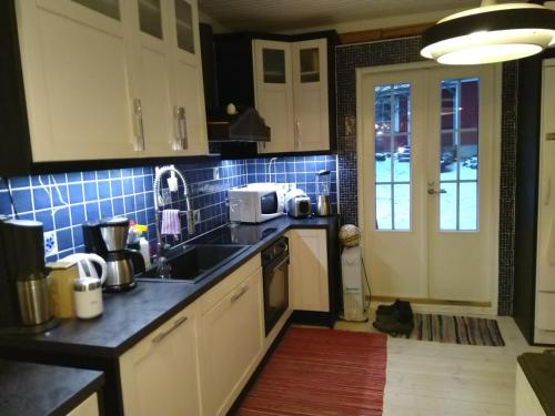 Cocina, 120 yrs. old log house in Kuopio city centre in Kuopio