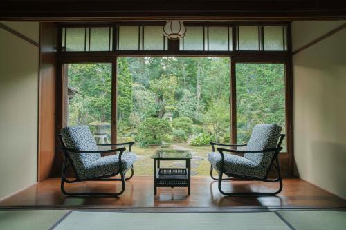 TOKONATSU Room with Tatami Area and Garden View