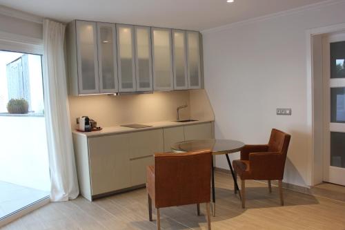 Apartamentos Arena Dorada - 주방