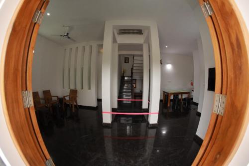 Faciliteiten, 215m² 3 slaapkamer, 3 privé badkamer Vrijstaande woning in Panamaram (AMMU'S HOME STAY provides an authentic homely stay) in Panamaram