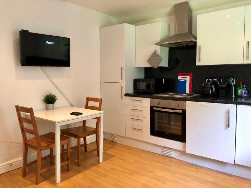 Block of 4 private apartments for groups of up to 26!