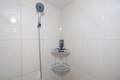 Elegant Studio Room at Springlake Summarecon Apartment By Travelio Elegant Studio Room at Springlake Summarecon Apartment By Travelio