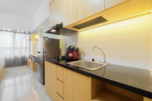 Modern Studio @ Springlake Summarecon Apartment By Travelio Modern Studio @ Springlake Summarecon Apartment By Travelio