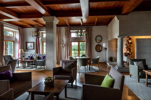 Shared lounge/TV area, Parador de Tui in Albelos