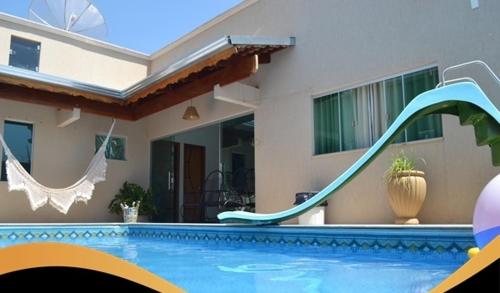 Linda Casa com Sauna, Hidromassagem, Piscina, Cascata, Churrasqueira e Suite Master!! in Popular