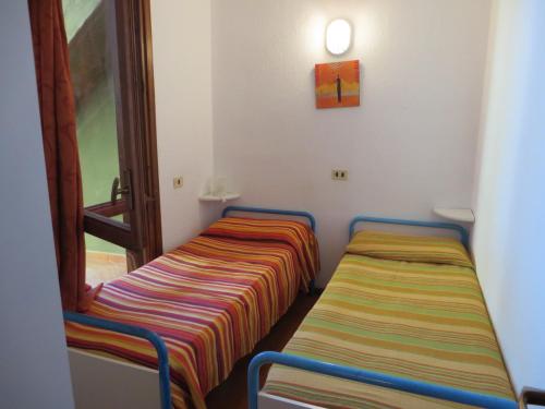 Accu is Prezzus tipo C1 fronte mare balcone - image 9
