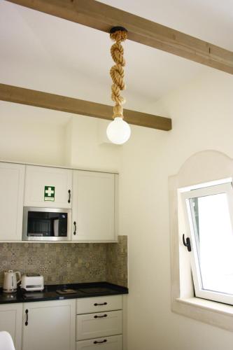 Kitchen, Quinta do Mocho Turismo Rural in Arretorta