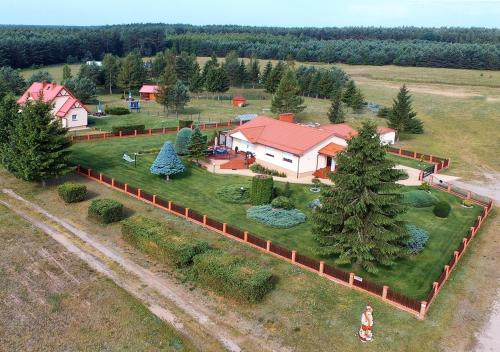 Зовнішній вигляд готелю, Agroturystyka RANCZO na Mazurach in Нідзіца 