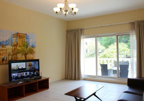 J5 One Bedroom Holiday Homes Dubai Investment Park - image 8