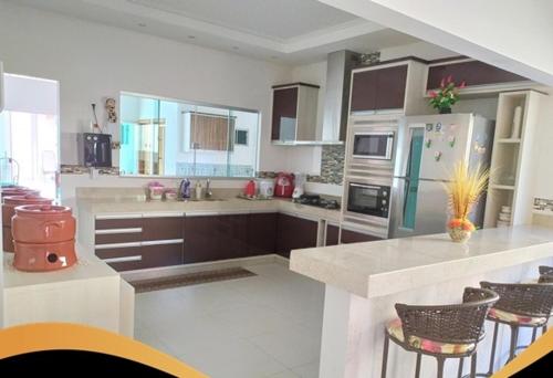 Exterior view, Linda Casa com Sauna, Hidromassagem, Piscina, Cascata, Churrasqueira e Suite Master!! in Popular