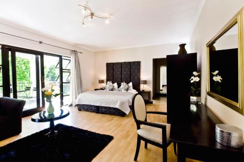 โรงแรมเซาธ์เทิร์นไลท์คันทรี่เฮ้าส์ (Southern Light Country House) near สวนพฤกศาสตร์แห่งชาติคีร์สเตนบอสช์