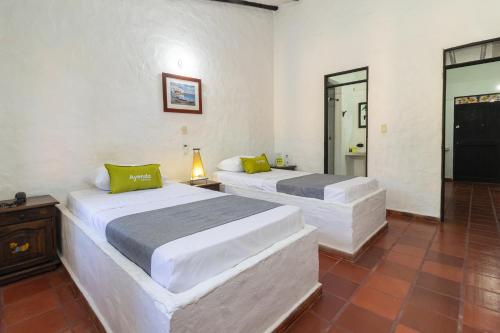 Ayenda 1701 Casa Corona Hotel Hacienda Real is conveniently located in the popular Villavicencio area. Featuring a complete list of amenities, guests will find their stay at the property a comfortable one. To be found at the
