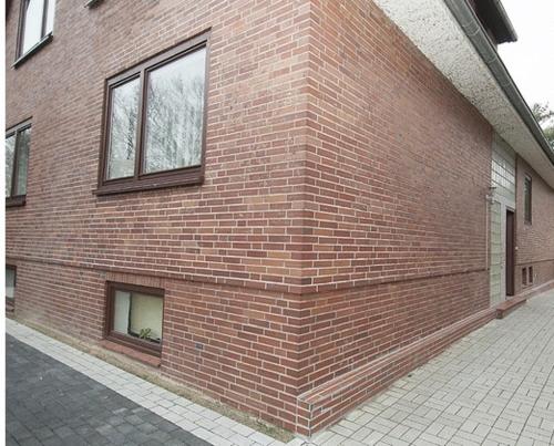 a brick building with a brick wall, Picklapp Apartments in Hamburg