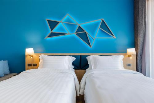 1 doppelbett oder 2 einzelbetten, deluxe, balkon
