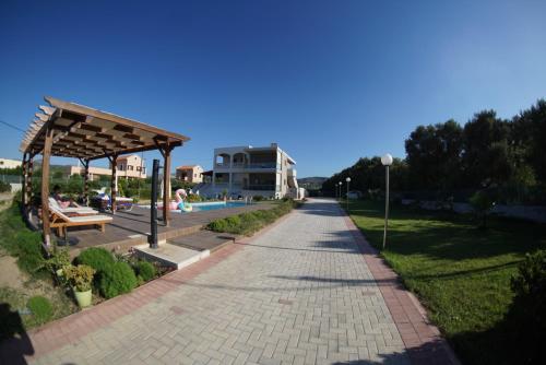 Garden, Niovi Seaside Suites near Camping Nopigia