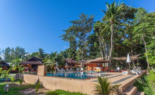 Swimming pool, Lanta Pearl Beach Resort near Thai Cat Restaurant